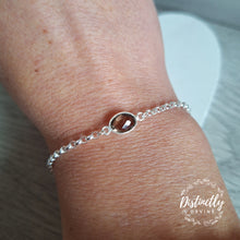 Load image into Gallery viewer, Wear this faceted cut, oval Smoky Quartz stone in this elegant Sterling Silver bracelet. Smoky Quartz is said to encourage emotional calmness, promote positive thoughts and reduce fatigue and tension.